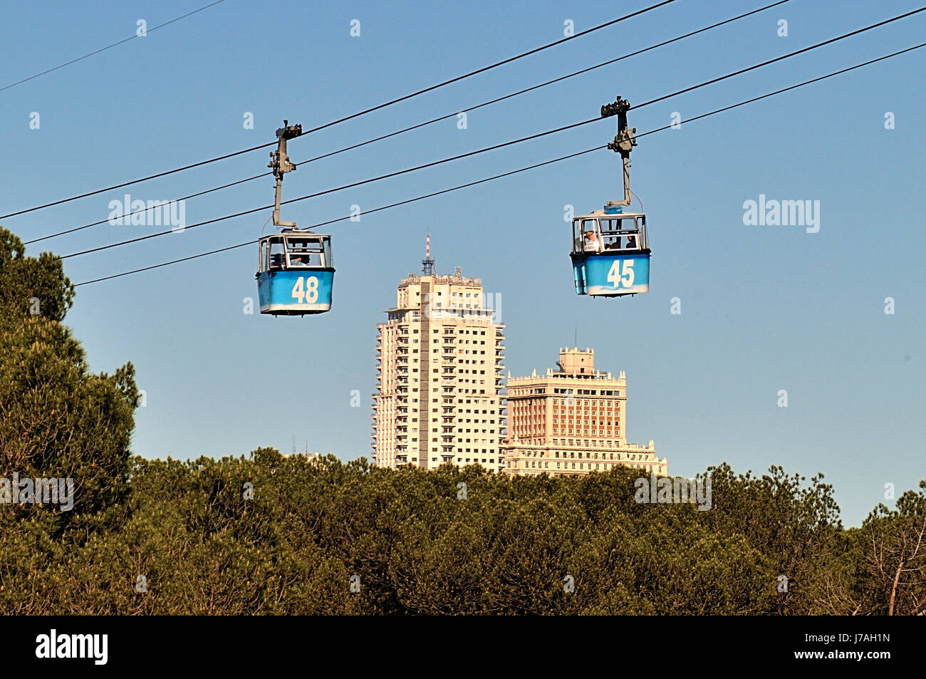 Rosales cable car, Casa de Campo park and Plaza de España towers. Madrid. Stock Photo