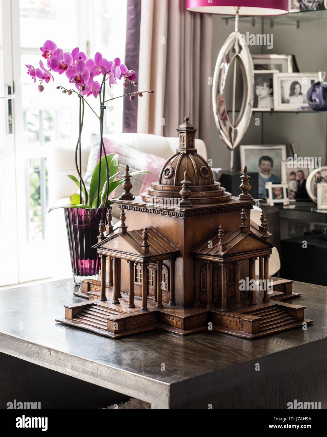 Architectural model and orchid in Victorian terrace, London Stock Photo