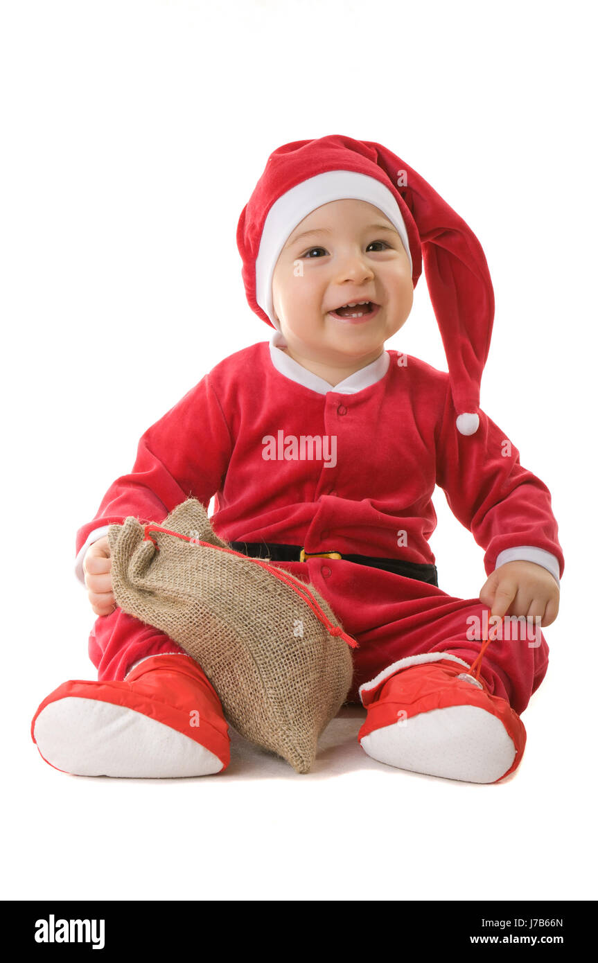 baby clothing christmas dressed clad xmas x-mas clothes wait waiting laugh Stock Photo