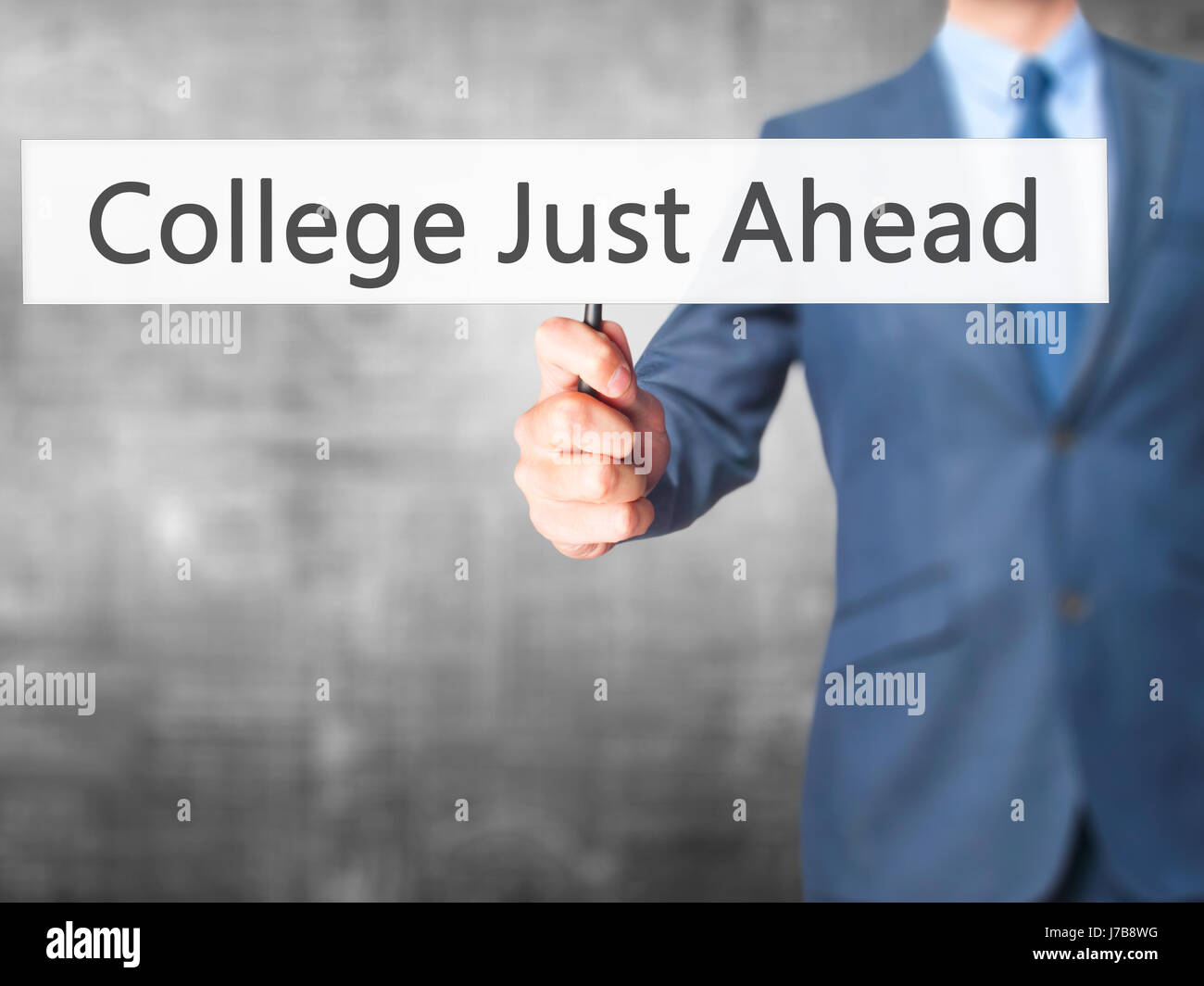 College Just Ahead Business man showing sign. Business, technology