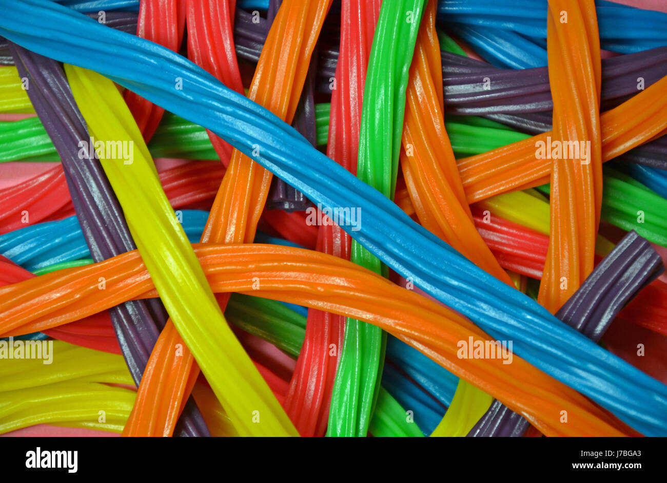 Colorful strings of licorice candy Stock Photo Alamy