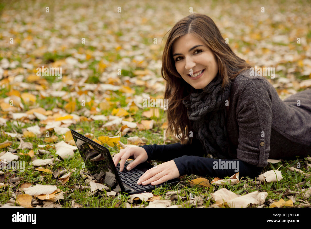 woman laptop notebook computers computer park lie lying lies wireless ...