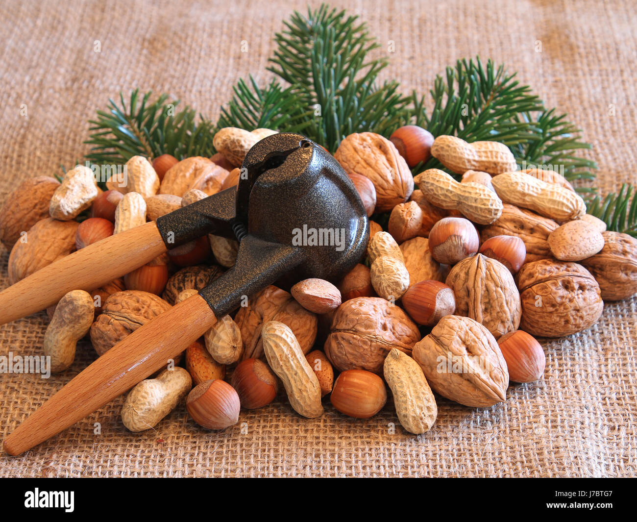 nuts and nutcracker Stock Photo - Alamy