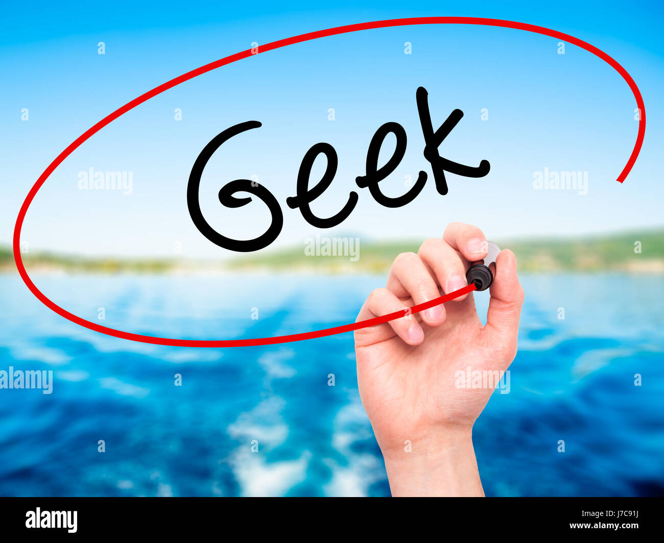 Man Hand writing Geek with black marker on visual screen. Isolated on ...