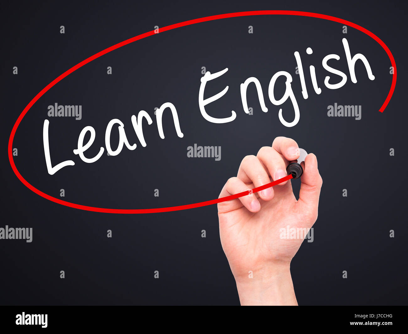 Man Hand writing Learn English with black marker on visual screen ...