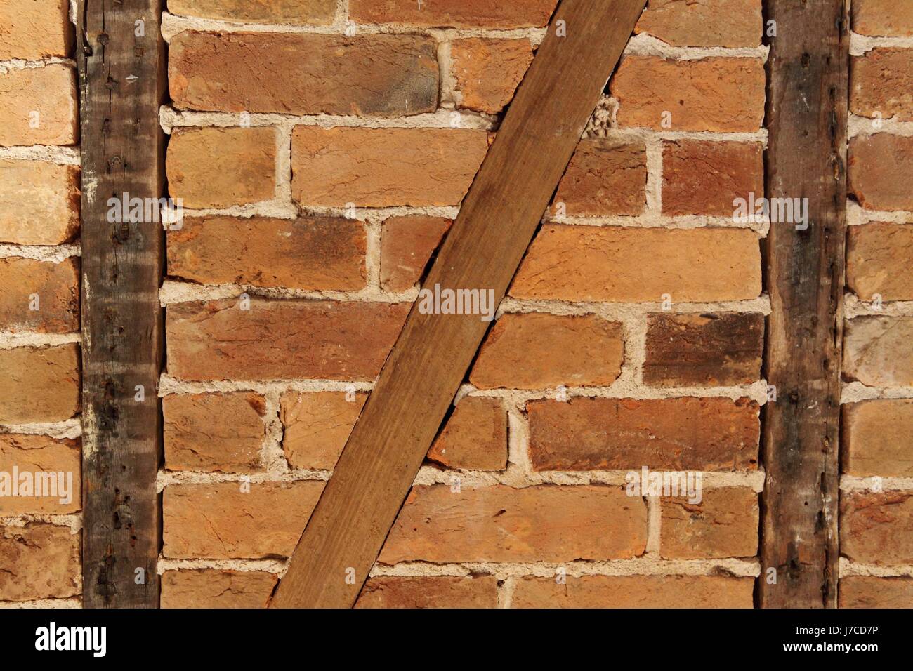 beam frame-work facade masonry clinker bricks old wood brown brownish brunette Stock Photo