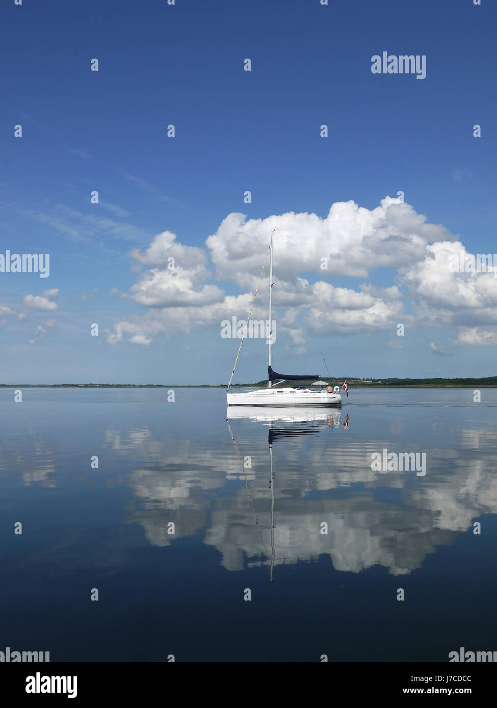 denmark mirroring sailing boat sailboat windlessness summer summerly sail radio Stock Photo