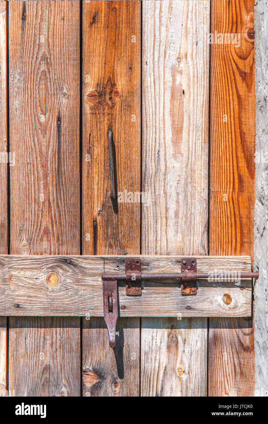 Closed old vintage wood door with rusty metal door lock Stock Photo - Alamy