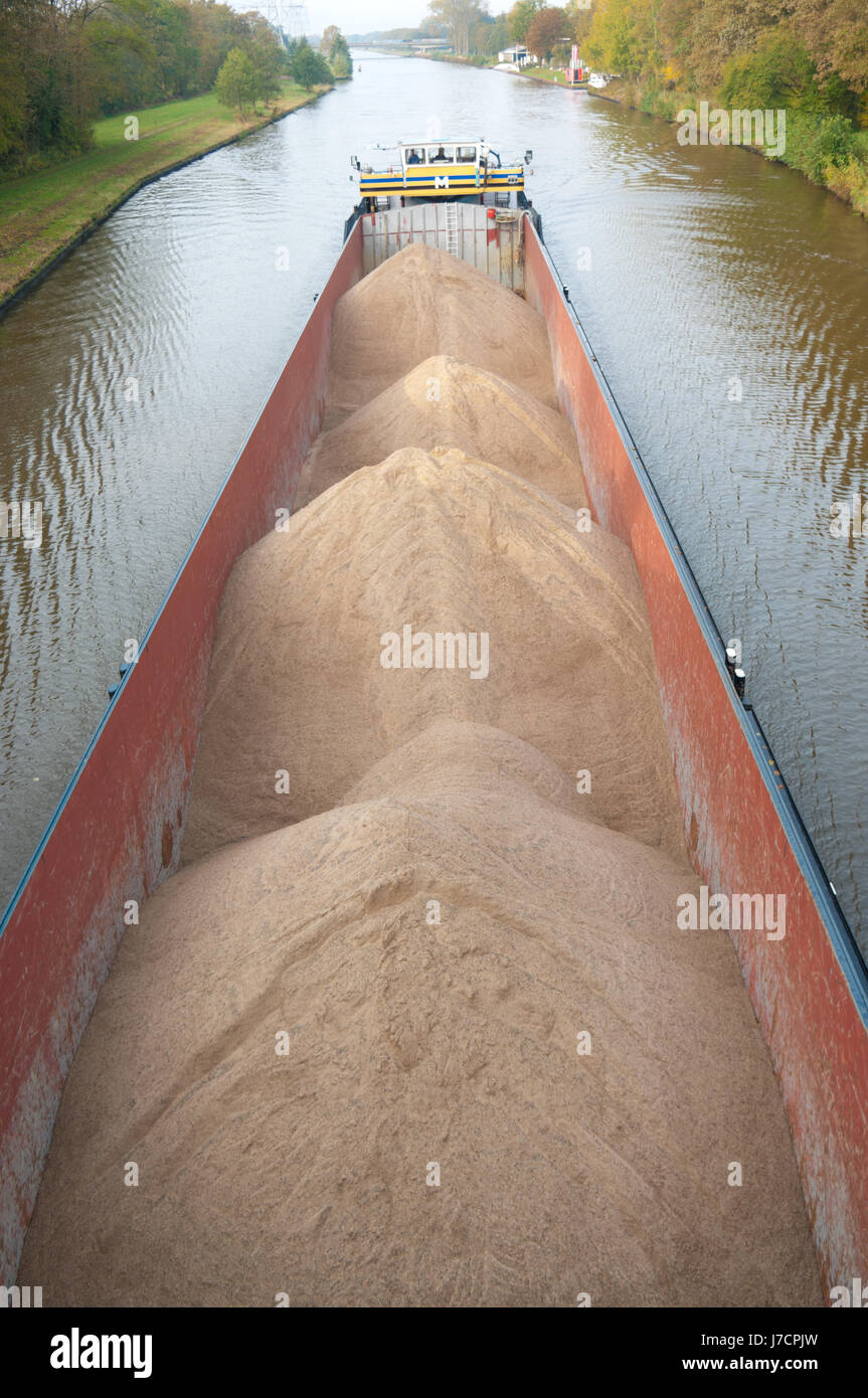 transport waterway freight ship barge cargo canal sands sand sailing boat Stock Photo