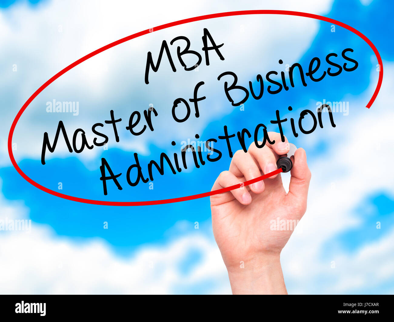Man Hand writing MBA Master of Business Administration with black marker on visual screen
