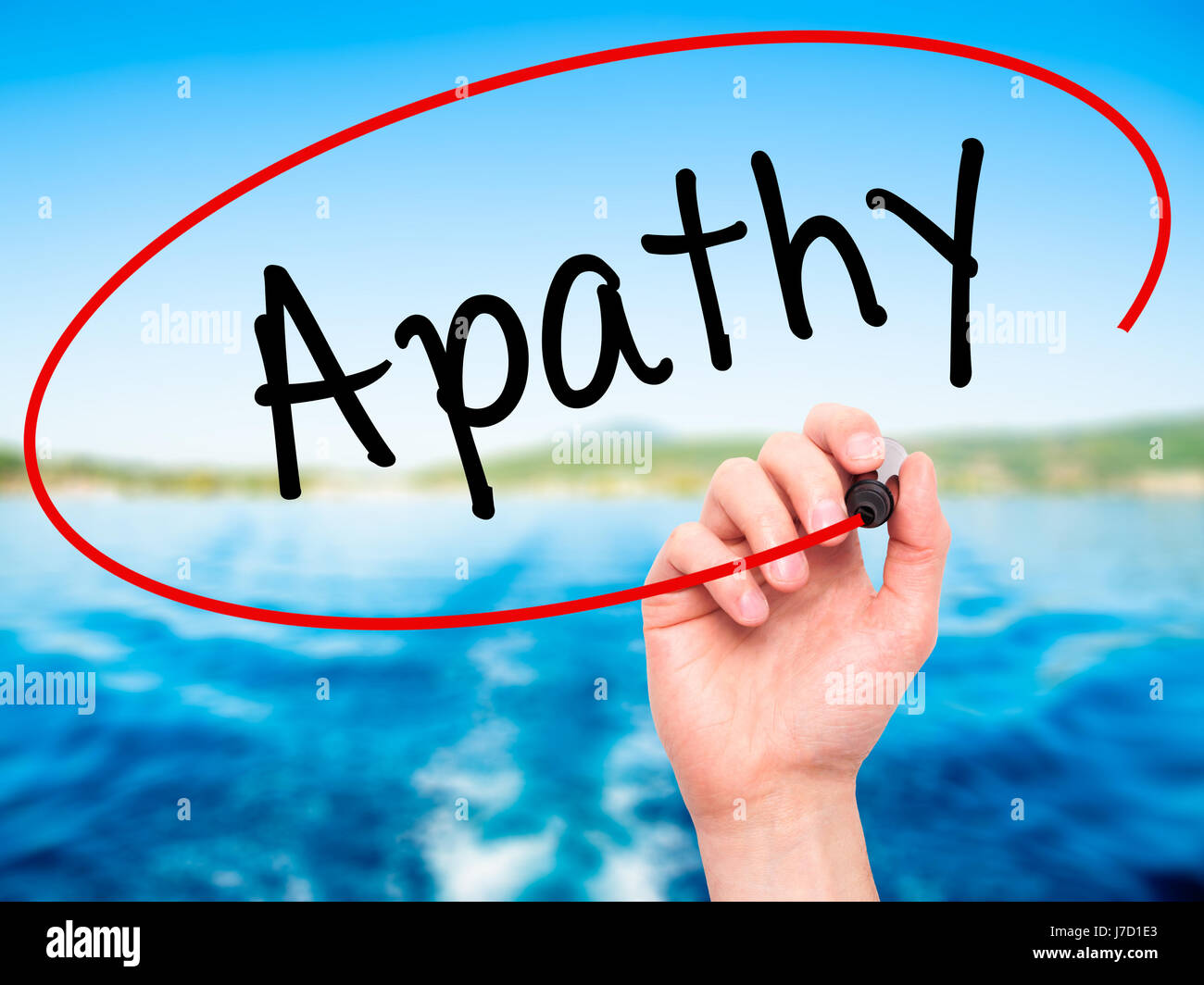 Man Hand writing Apathy with black marker on visual screen. Isolated on ...