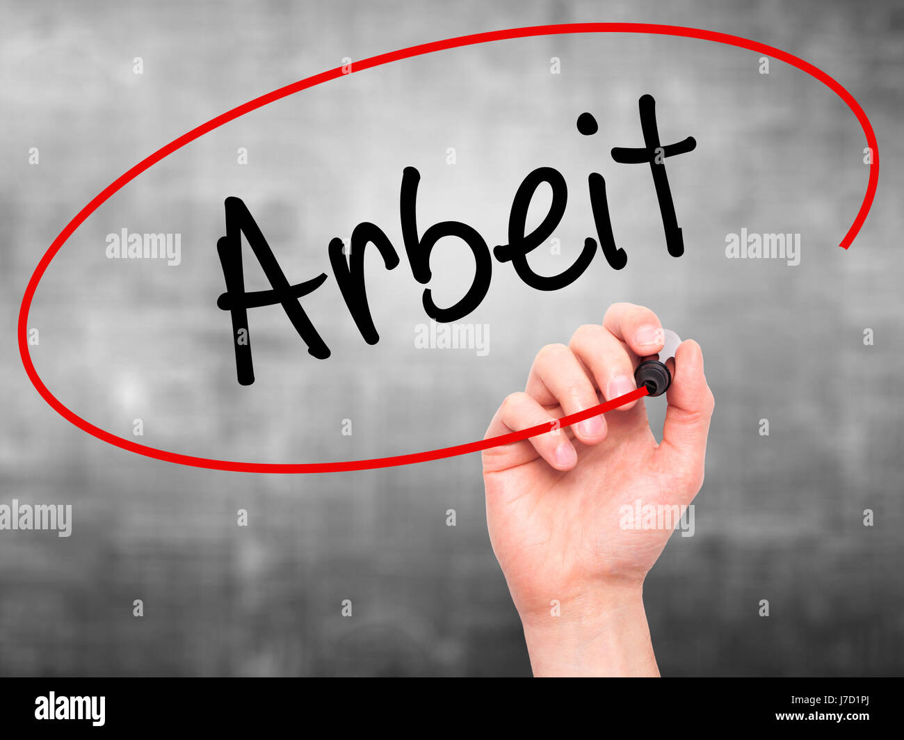 Man Hand writing Arbeit (Work in German) with black marker on visual ...