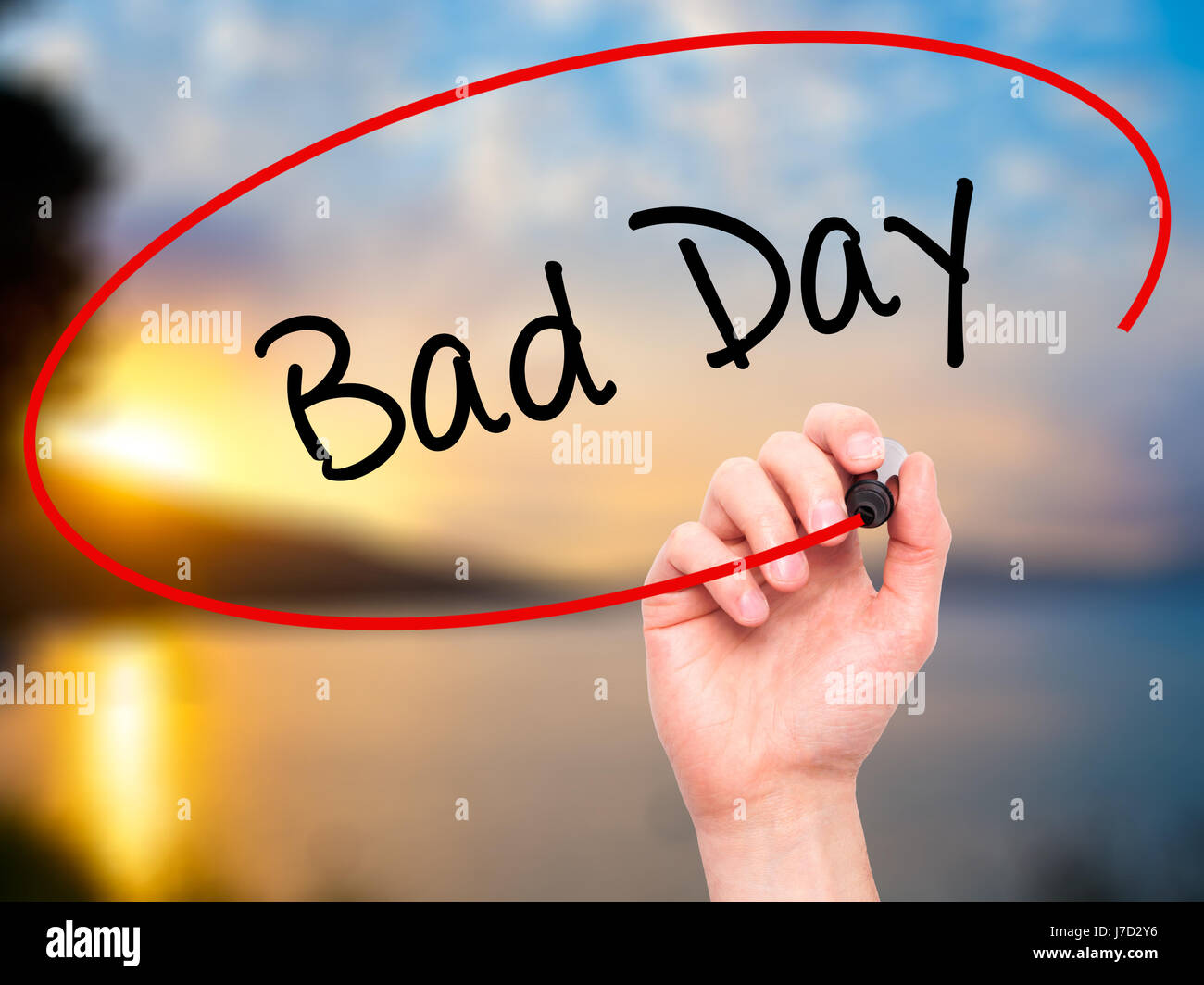 Man Hand writing Bad Day with black marker on visual screen. Isolated ...
