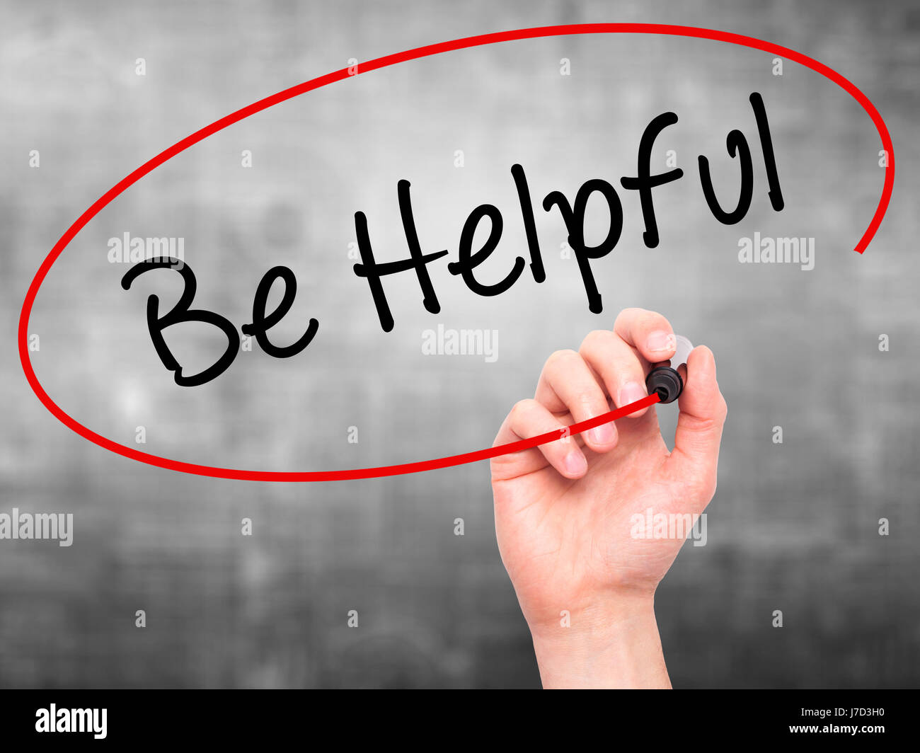 Man Hand writing Be Helpful with black marker on visual screen ...