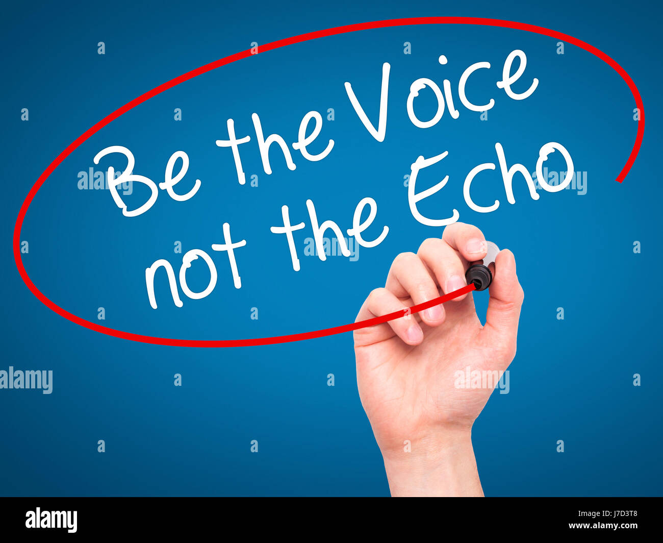 Man Hand writing Be the Voice not the Echo with black marker on visual screen. Isolated on