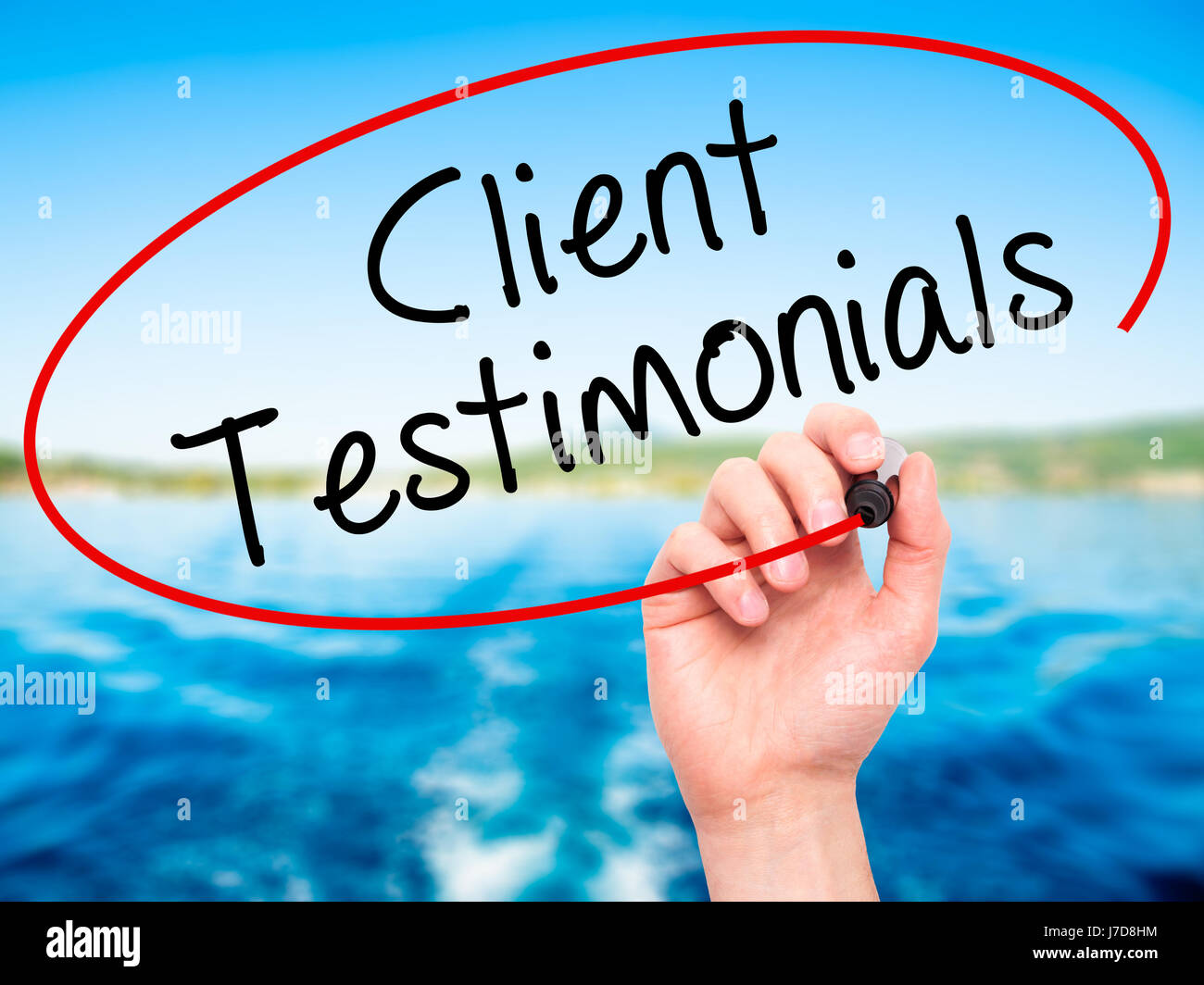 Testimonials In Man Man Hand writing Client Testimonials with black marker on visual screen ...