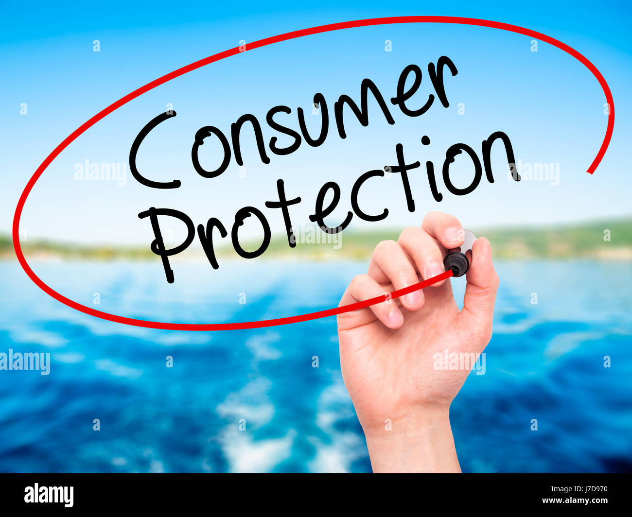 Man Hand writing Consumer Protection with black marker on visual screen ...