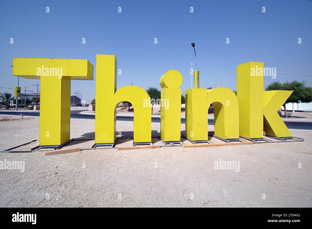 Exhortatory sign urging 'Think' on the campus of Education City, Doha, Qatar Stock Photo