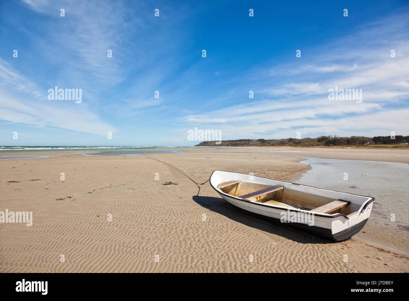 Small boat on the beach of Bonnerup at ebb tide Stock Photo Alamy