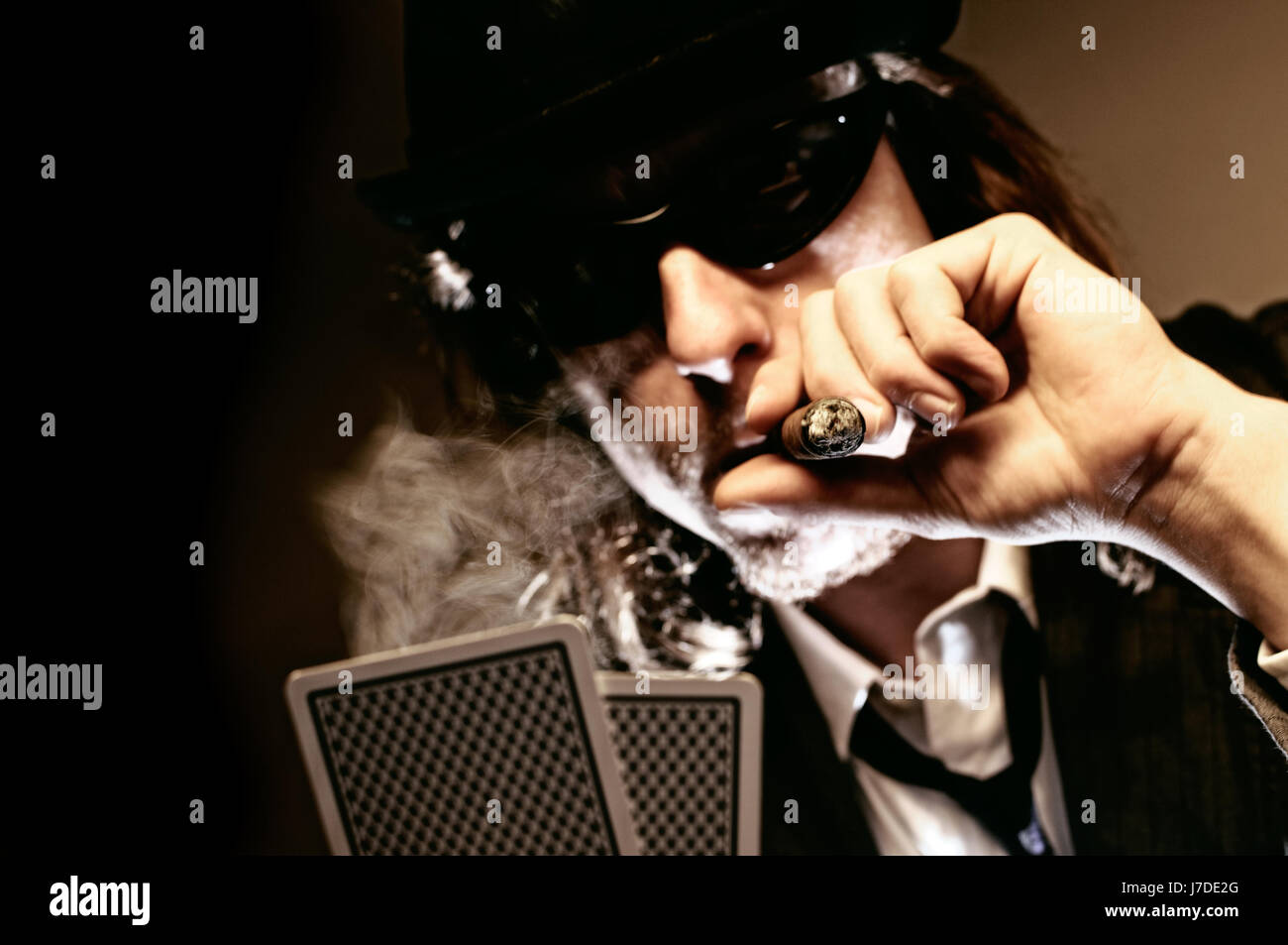 Man smoking cigarette playing game hires stock photography and images