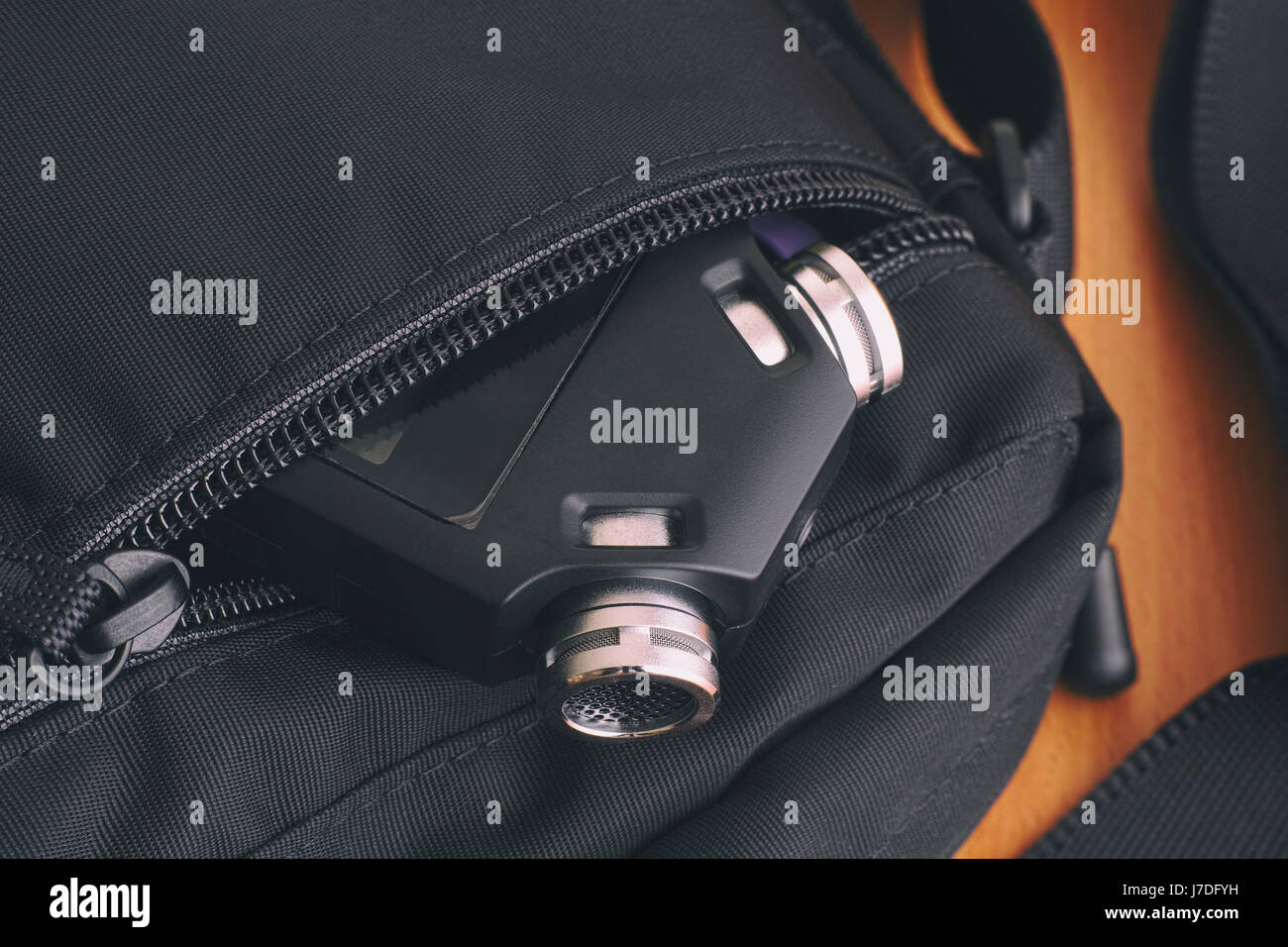 Voice recorder in a bag. Close up. Stock Photo