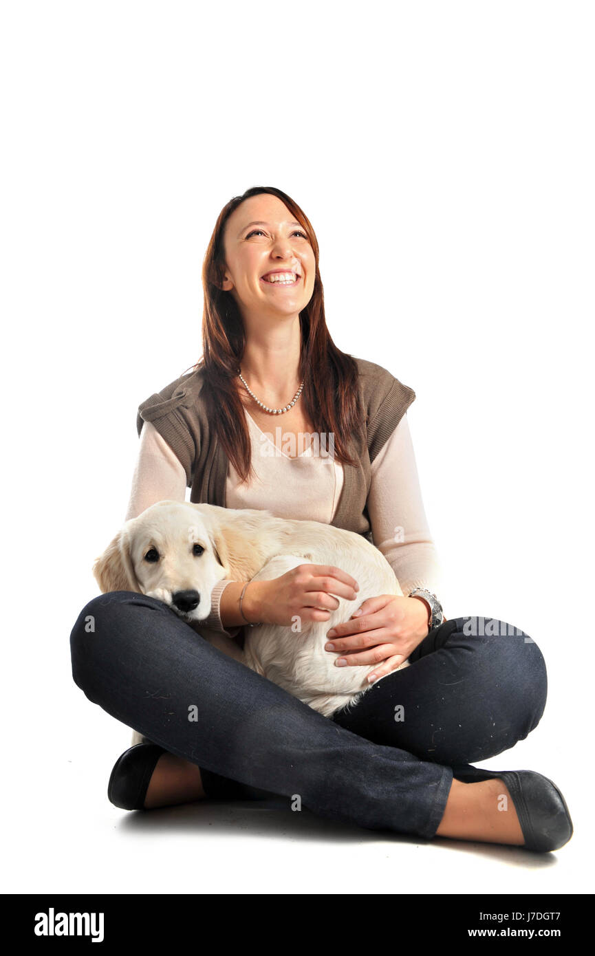 woman dog golden puppy girl girls laugh laughs laughing twit giggle smile Stock Photo