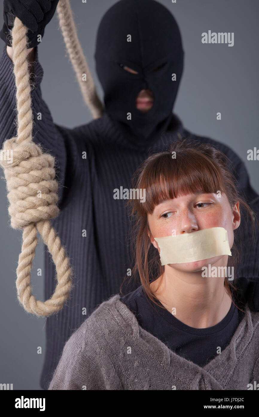 woman fear torture victim hangman terrorist hostage woman danger female fear Stock Photo
