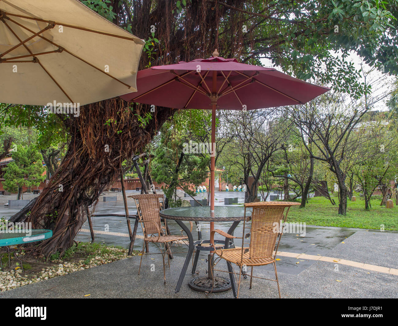 A table  with umbrella waiting for tourists in Taiwan Stock Photo