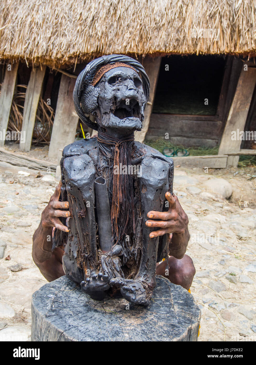 Wamena, Indonesia - January 23, 2015: Mummy presented by a member of the Dali tribe, near  Wamena town in the heart of Baliem Valley Stock Photo