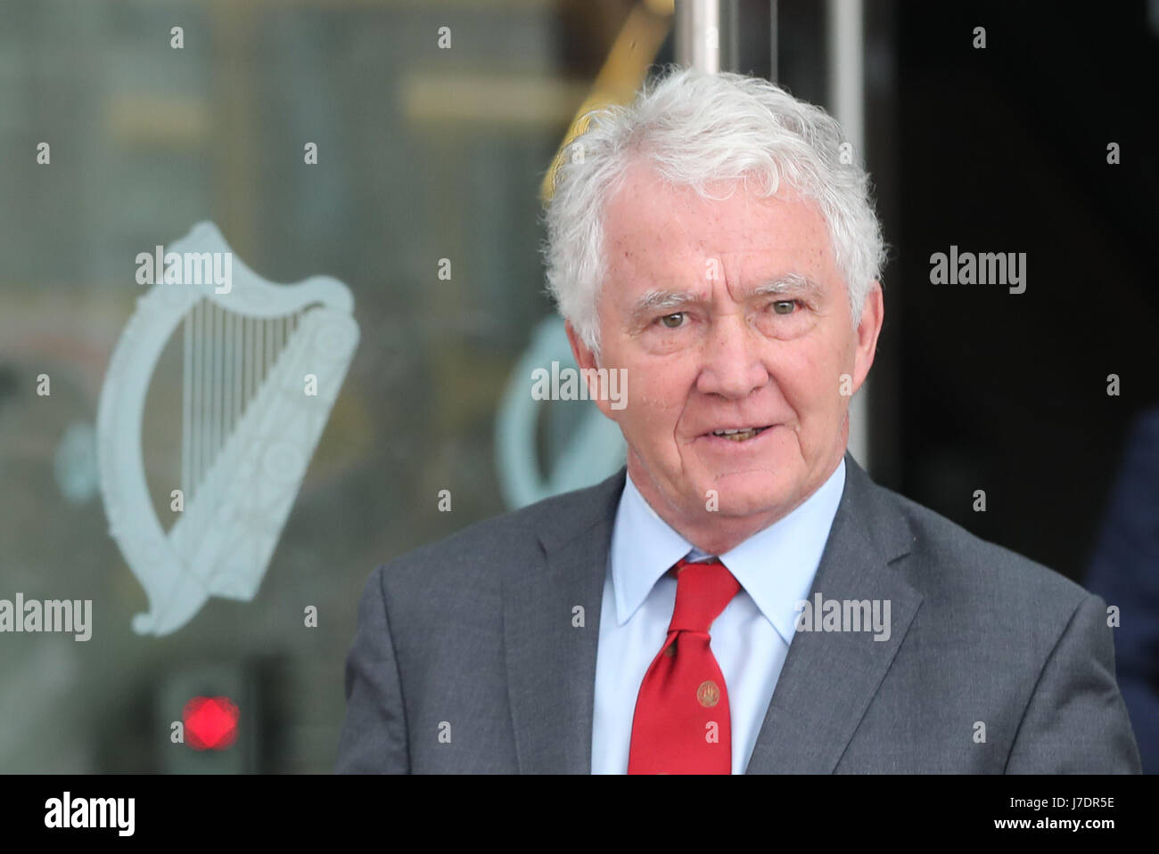 Former Anglo Irish Bank chairman Sean Fitzpatrick leaves the Dublin