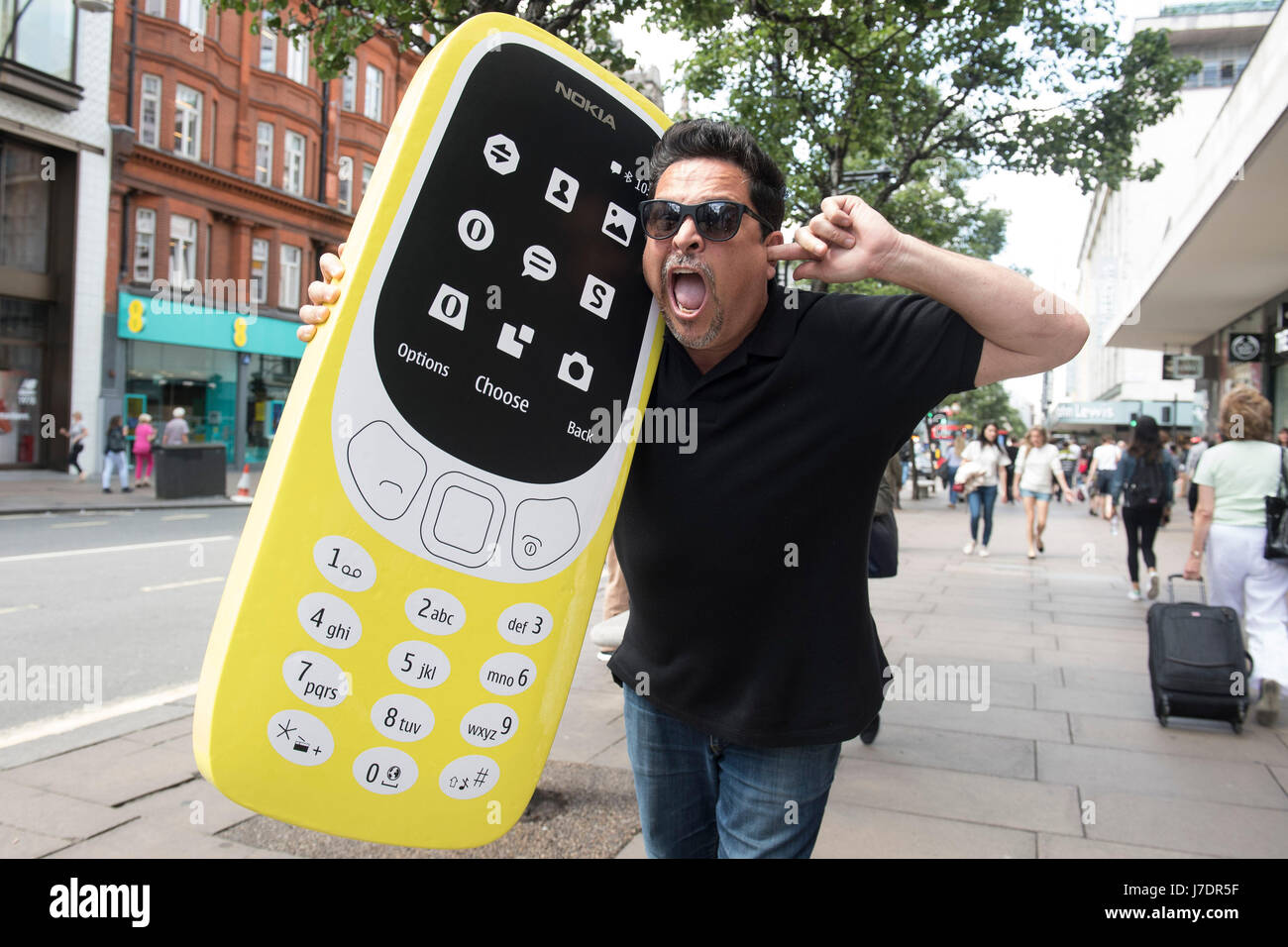 comedian-dom-joly-recreates-a-trigger-happy-tv-moment-to-launch-the-J7DR5F.jpg