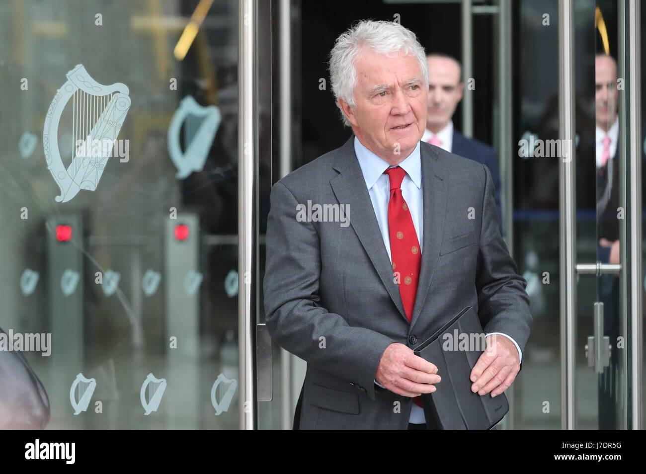 Former Anglo Irish Bank chairman Sean Fitzpatrick leaves the Dublin