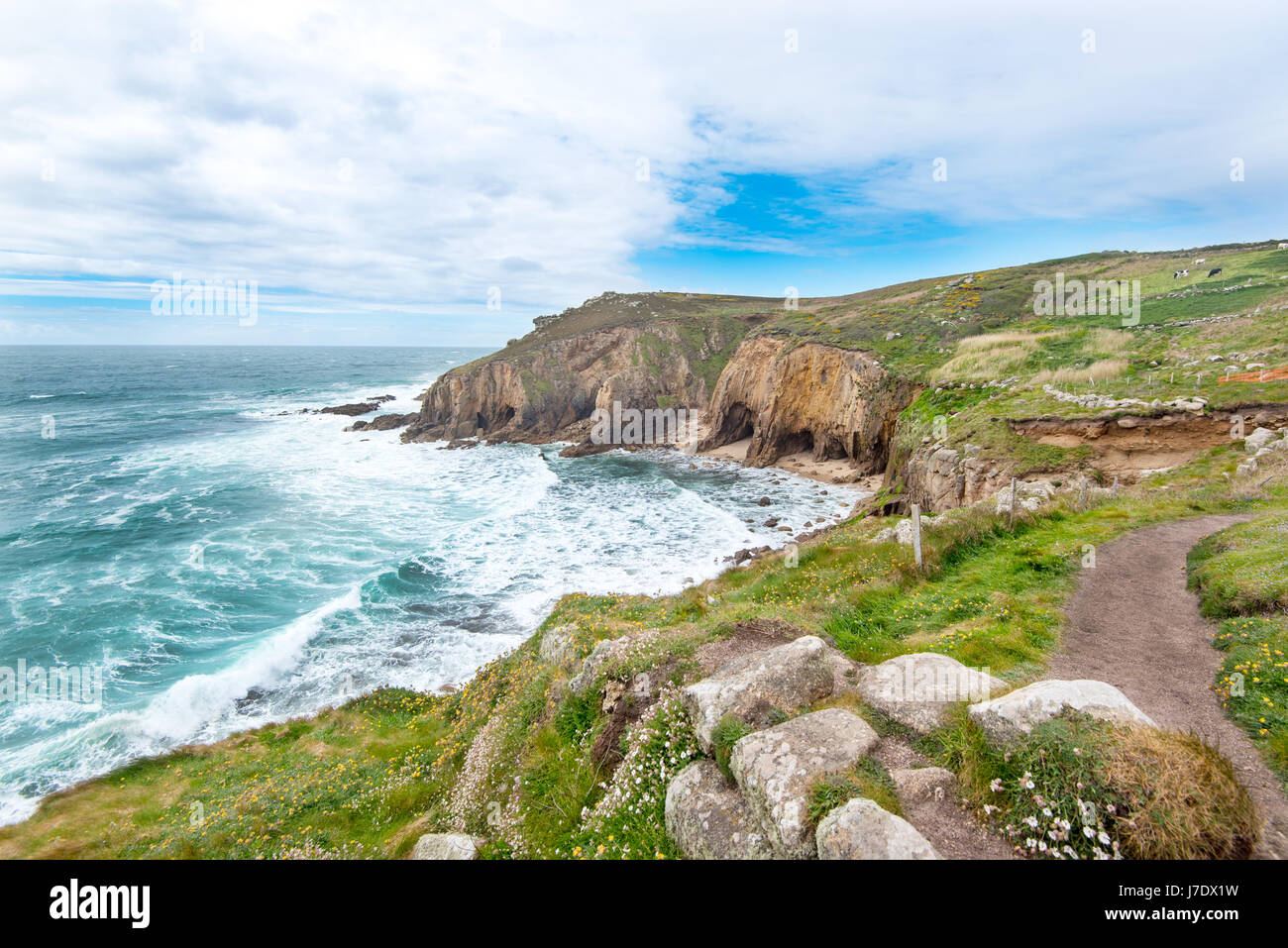 The Northern end of Mill Bay or Nanjizal is about 2km south of Lands End, Cornwall, UK. The rock known as Diamond Horse can be seen in the middle of t Stock Photo