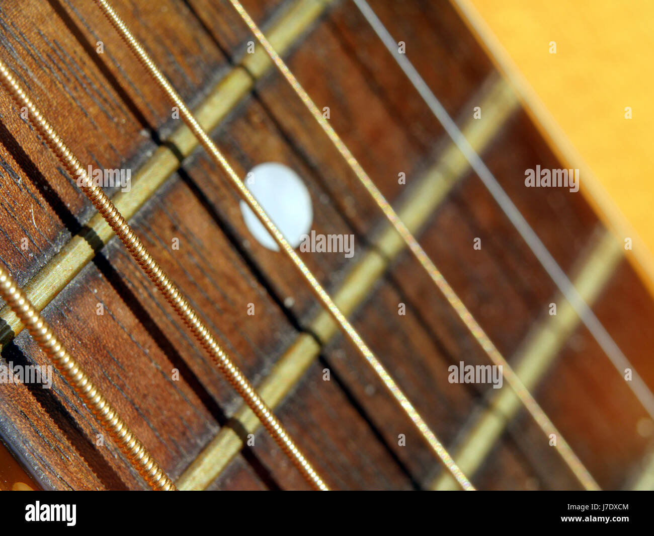 Close up detail of acoustic guitar strings and fittings Stock Photo - Alamy