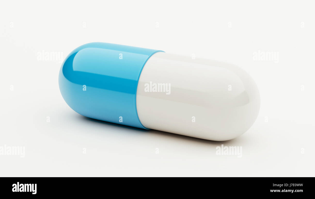 Pill on a white background Stock Photo - Alamy
