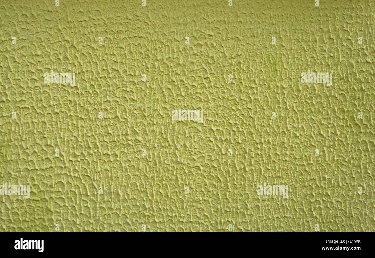 Yellow, lime green plaster wall texture Stock Photo