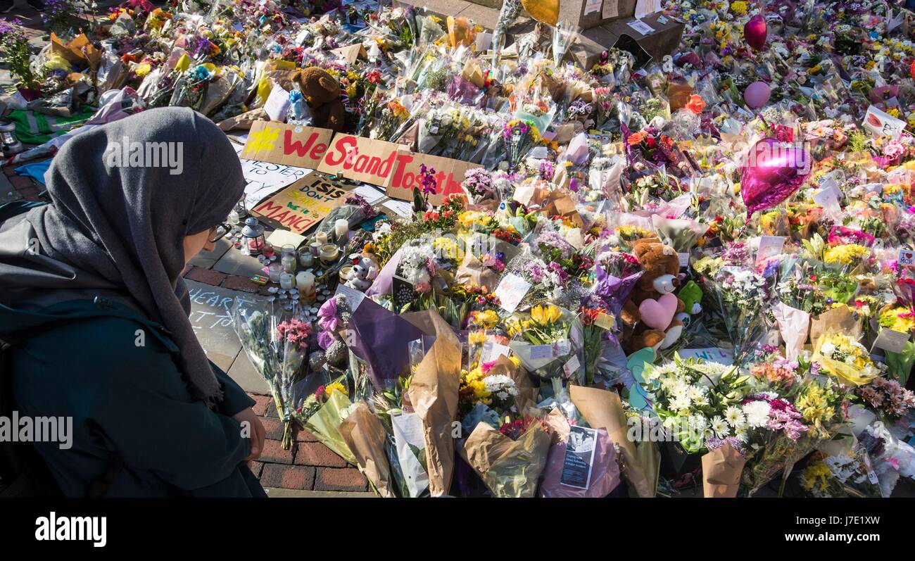 Floral tributes in St. Ann's Square, close to the Manchester Arena where a suicide bomber killed 22 people leaving a pop concert at the venue on Monday night. Stock Photo