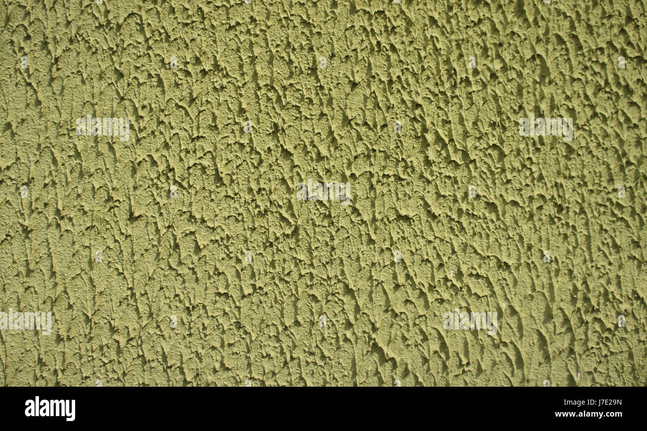 Yellow, lime green plaster wall texture Stock Photo