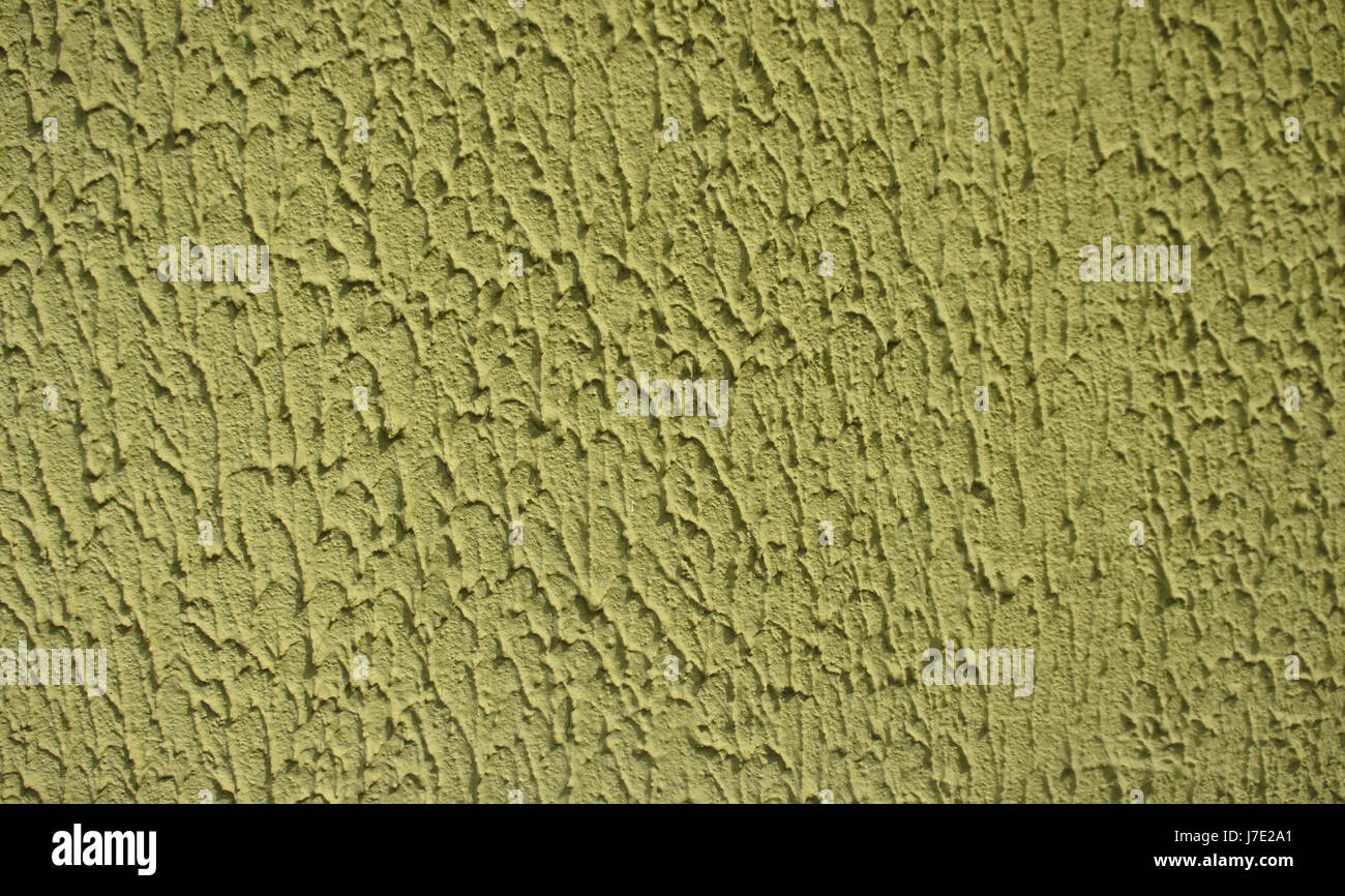 Yellow, lime green plaster wall texture Stock Photo