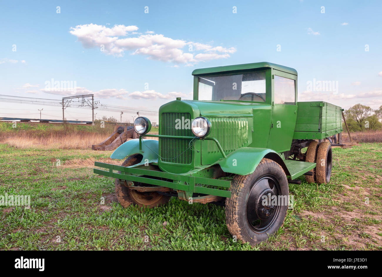 Vintage retro soviet green truck in the field Stock Photo
