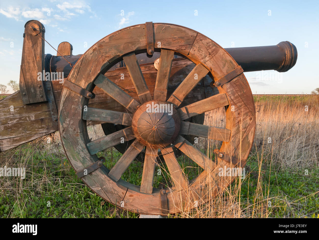 Large wooden wheel of old cannon Stock Photo