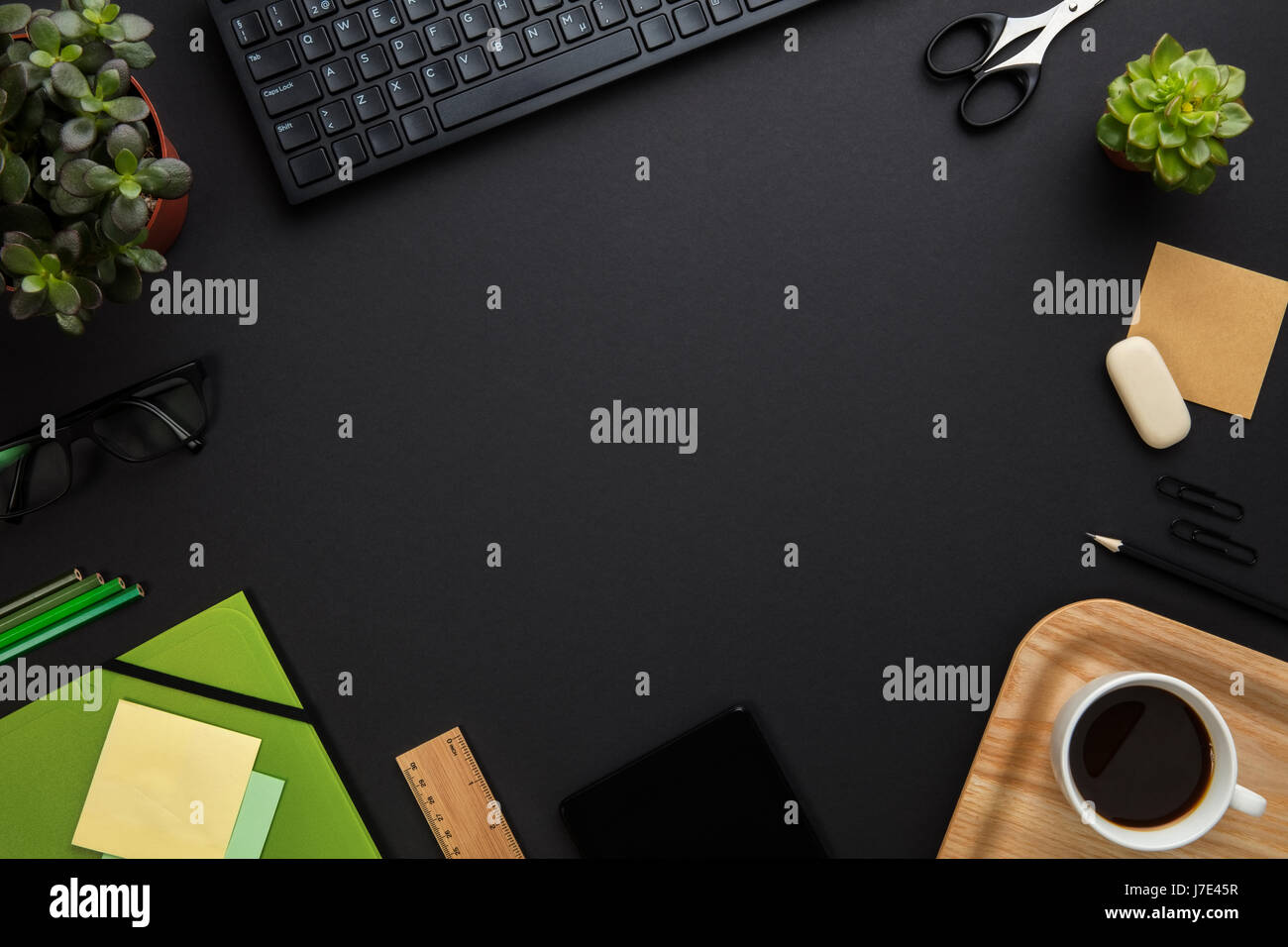 Office Equipment And Computer Keyboard Arranged On Gray Desk Stock