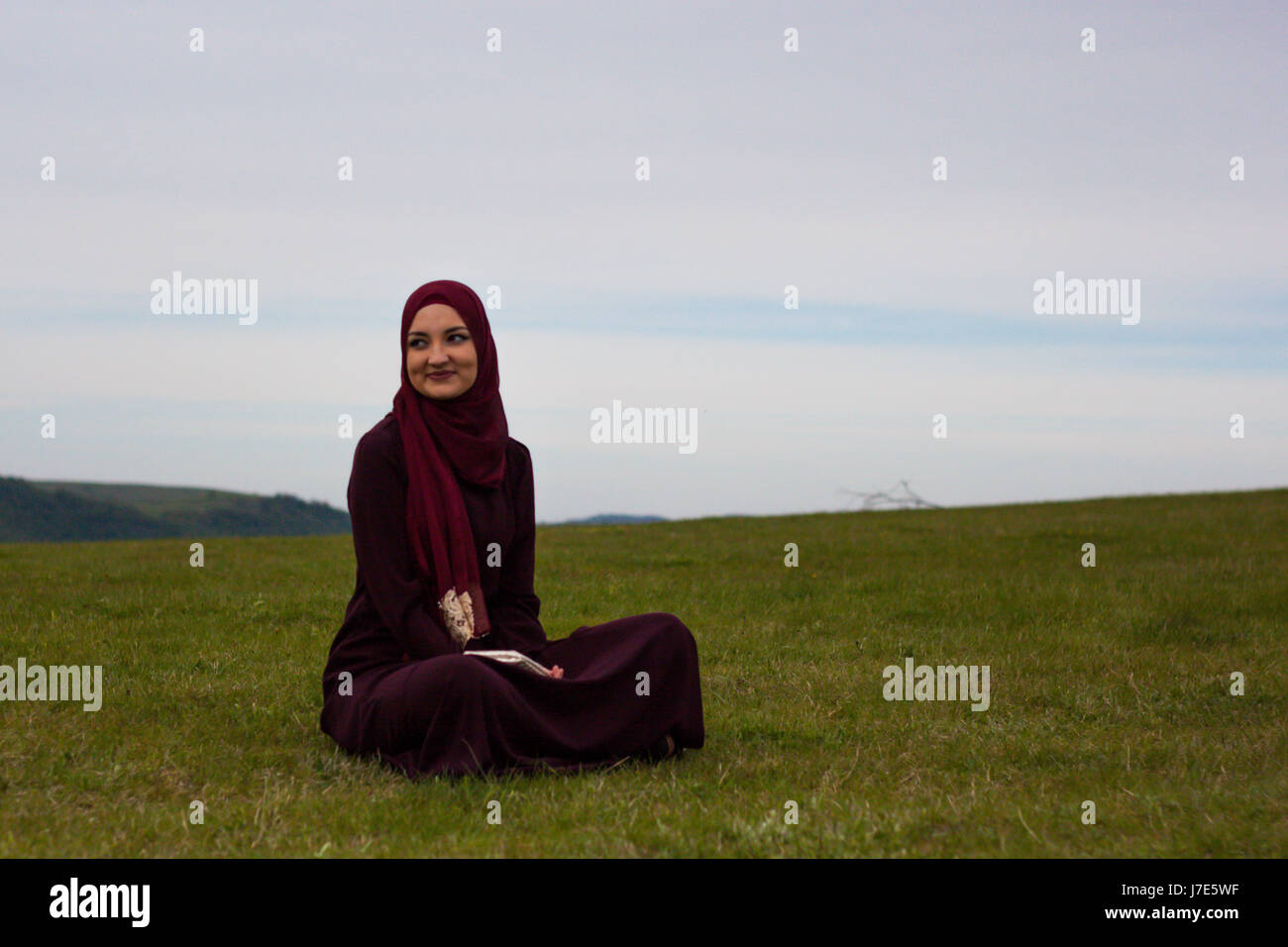 Muslim girl praying Stock Photo by ©Myvisuals 118355434