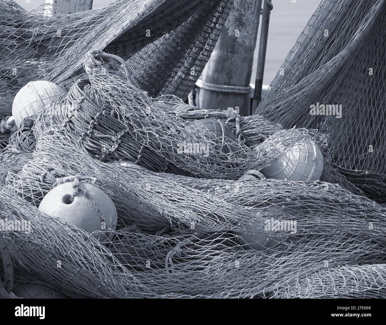String of fishing net floats hi-res stock photography and images - Alamy