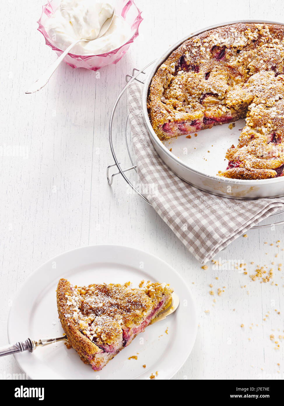 Plum cake with brittles Stock Photo