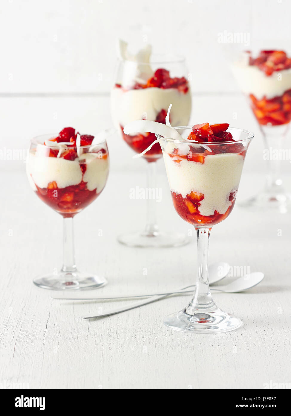 Semolina creme with coconut and strawberries Stock Photo