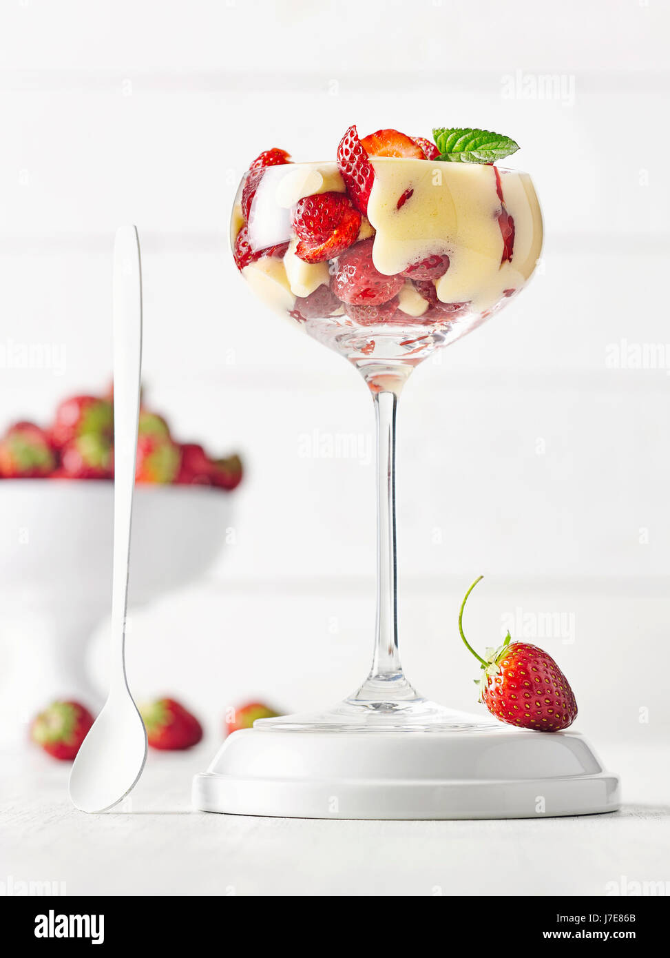 Strawberries with elder zabaione Stock Photo