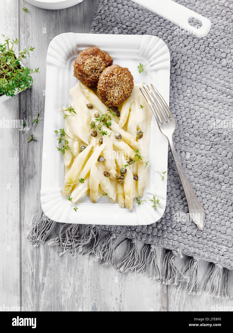 Meatballs with asparagus Stock Photo