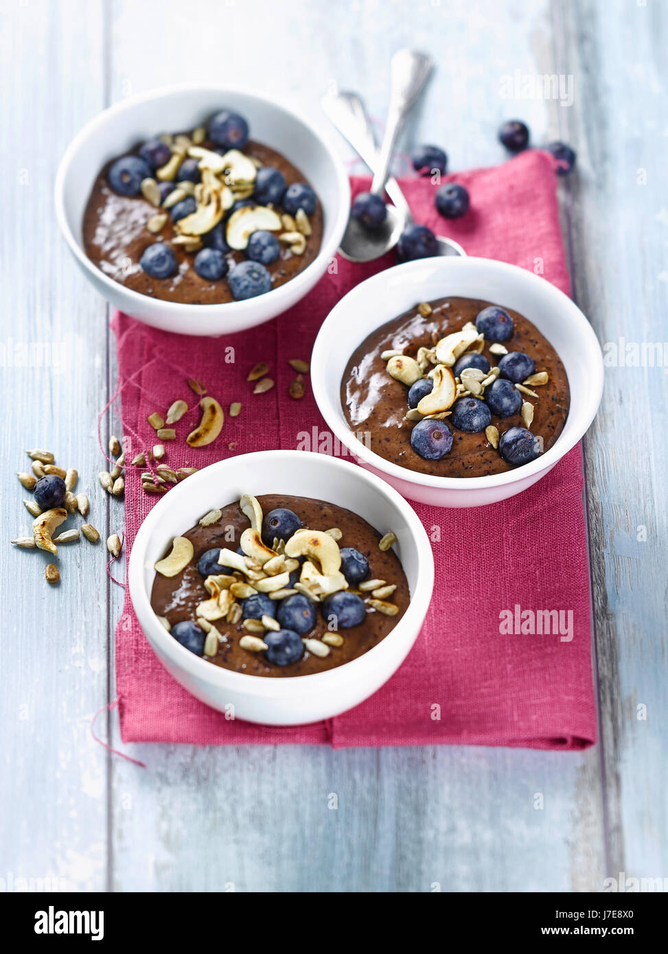Blueberry smoothie bowl with plums Stock Photo