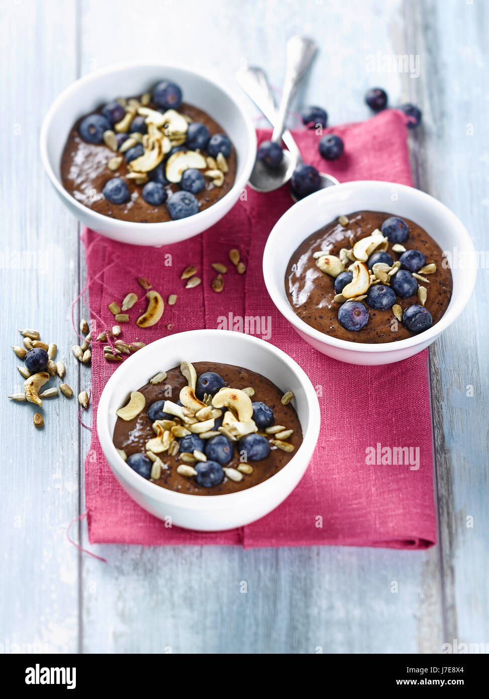 Blueberry smoothie bowl with plums Stock Photo
